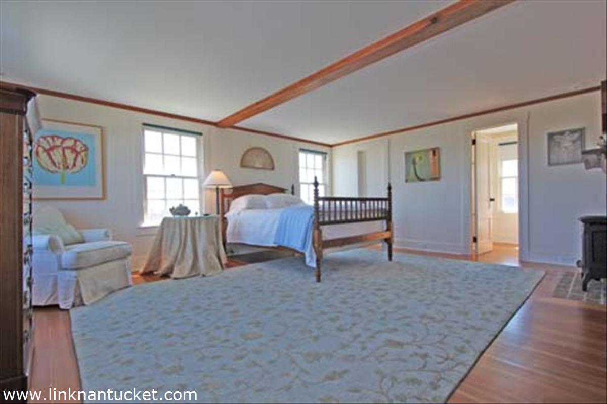 68 Baxter Road Nantucket, MA 02554 - Photo 12 of 22 Master Bedroom with fireplace & private bath
