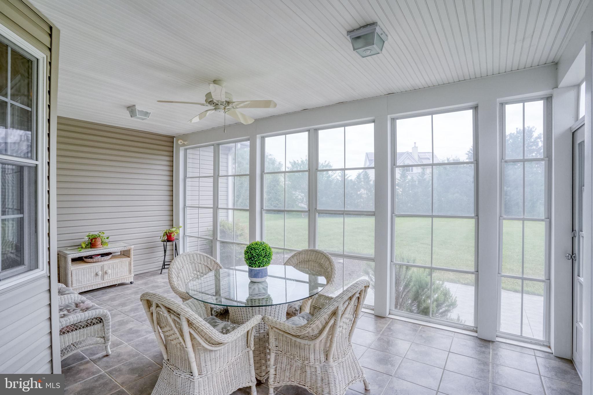 36 Kenmare Way Rehoboth Beach, DE 19971 - Photo 6 of 62 Screen porch with 3-season click-down windows.