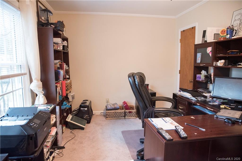 101 Sycamore Road, Unit 209 Salisbury, NC 28147 - Photo 20 of 33 a view of a workspace with furniture and a window