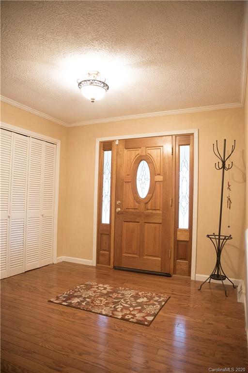 101 Sycamore Road, Unit 209 Salisbury, NC 28147 - Photo 25 of 33 a view of a livingroom with wooden floor