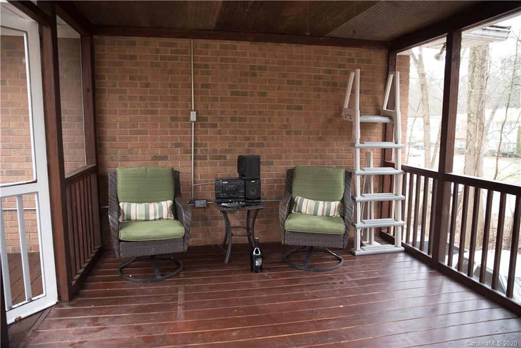 101 Sycamore Road, Unit 209 Salisbury, NC 28147 - Photo 27 of 33 a view of a patio with couches