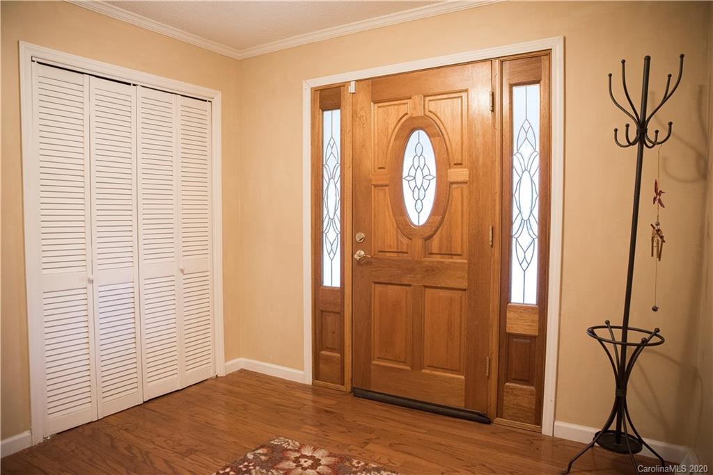 101 Sycamore Road, Unit 209 Salisbury, NC 28147 - Photo 5 of 33 a view of a hallway with wooden floor