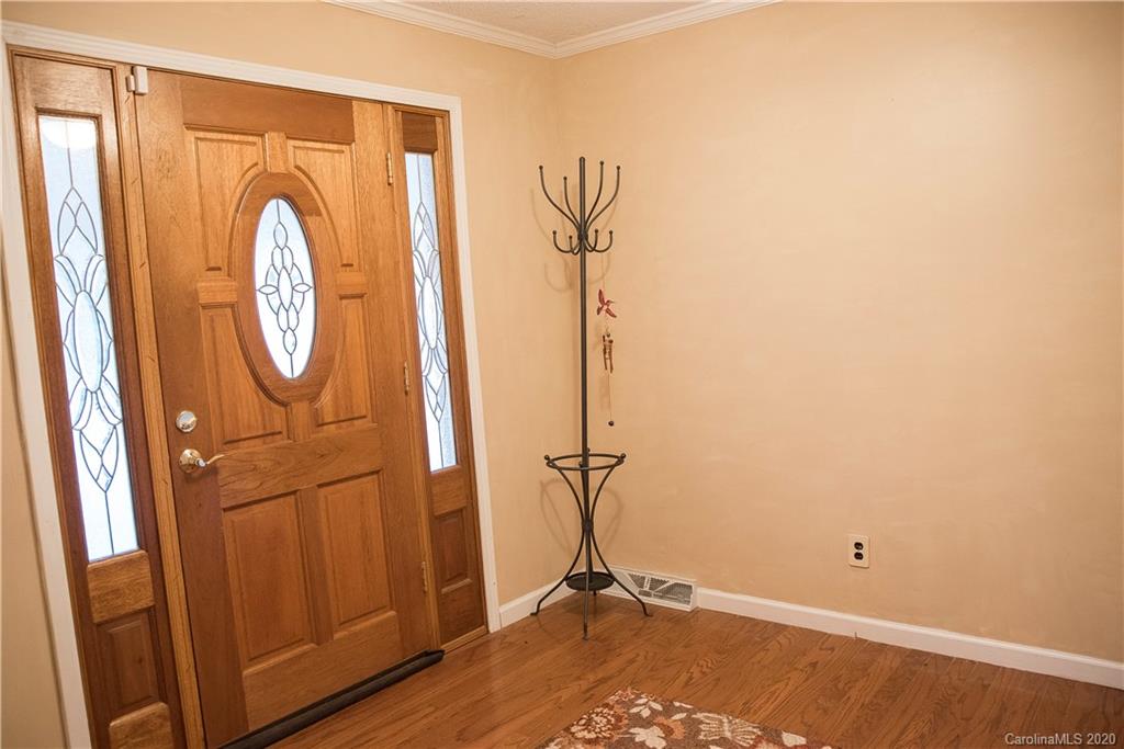 101 Sycamore Road, Unit 209 Salisbury, NC 28147 - Photo 6 of 33 a view of an entryway with wooden floor