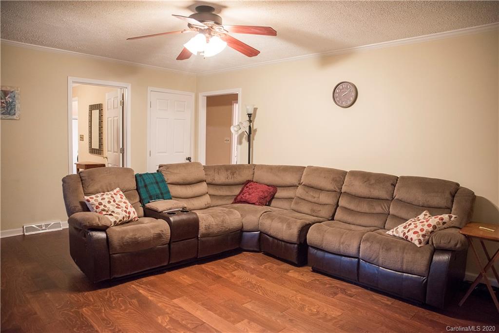 101 Sycamore Road, Unit 209 Salisbury, NC 28147 - Photo 7 of 33 a living room with couches and kitchen view
