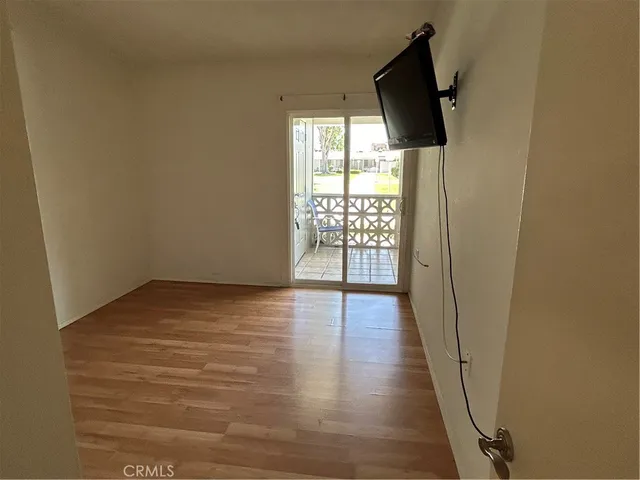 a view of entryway with wooden floor