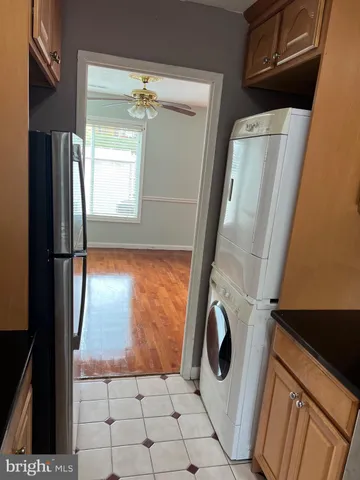 a close view of a refrigerator a washer and dryer