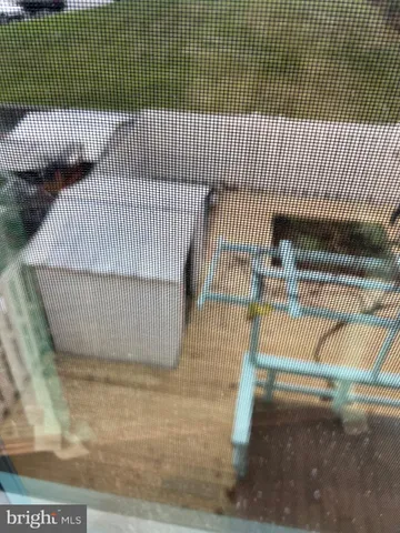 a view of a balcony with a patio