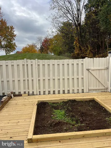 a view of a backyard of the house