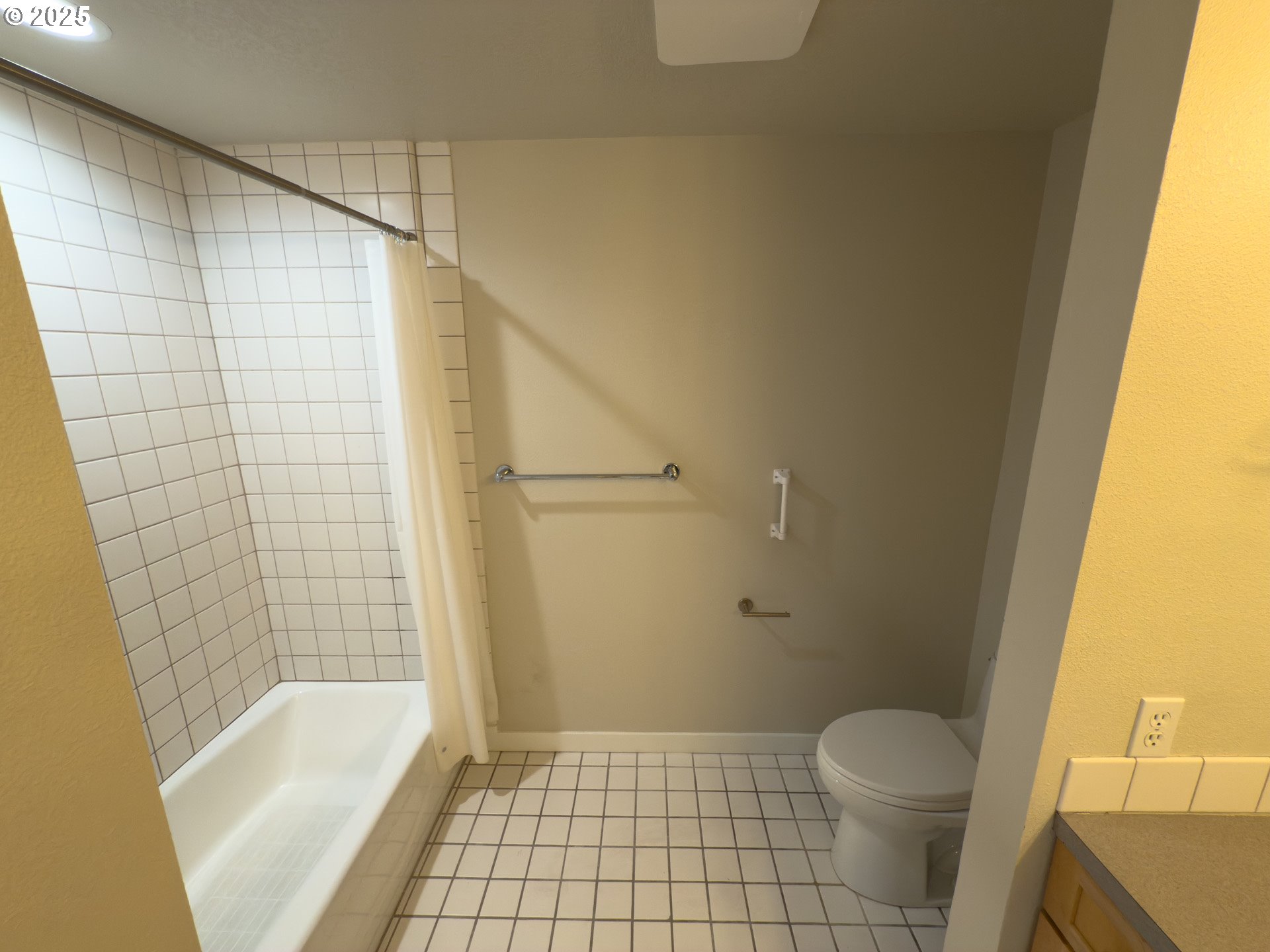 2327 Northwest Northrup Street, Unit 8 Portland, OR 97210 - Photo 14 of 33 a bathroom with a toilet and a shower