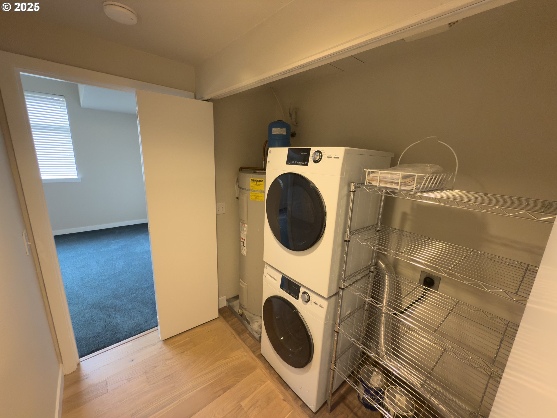 2327 Northwest Northrup Street, Unit 8 Portland, OR 97210 - Photo 16 of 33 a utility room with dryer and washer