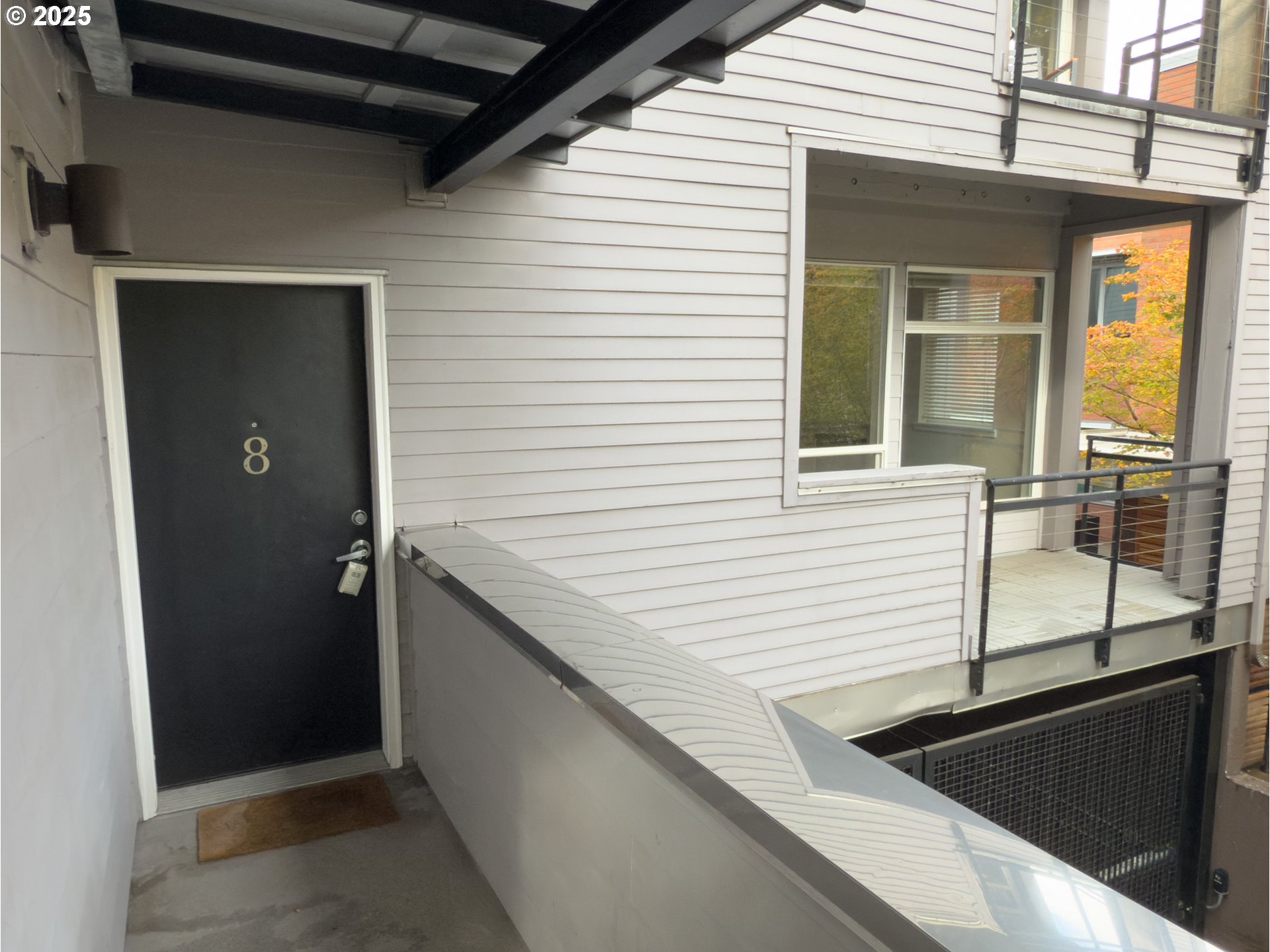 2327 Northwest Northrup Street, Unit 8 Portland, OR 97210 - Photo 2 of 33 a view of a house and window