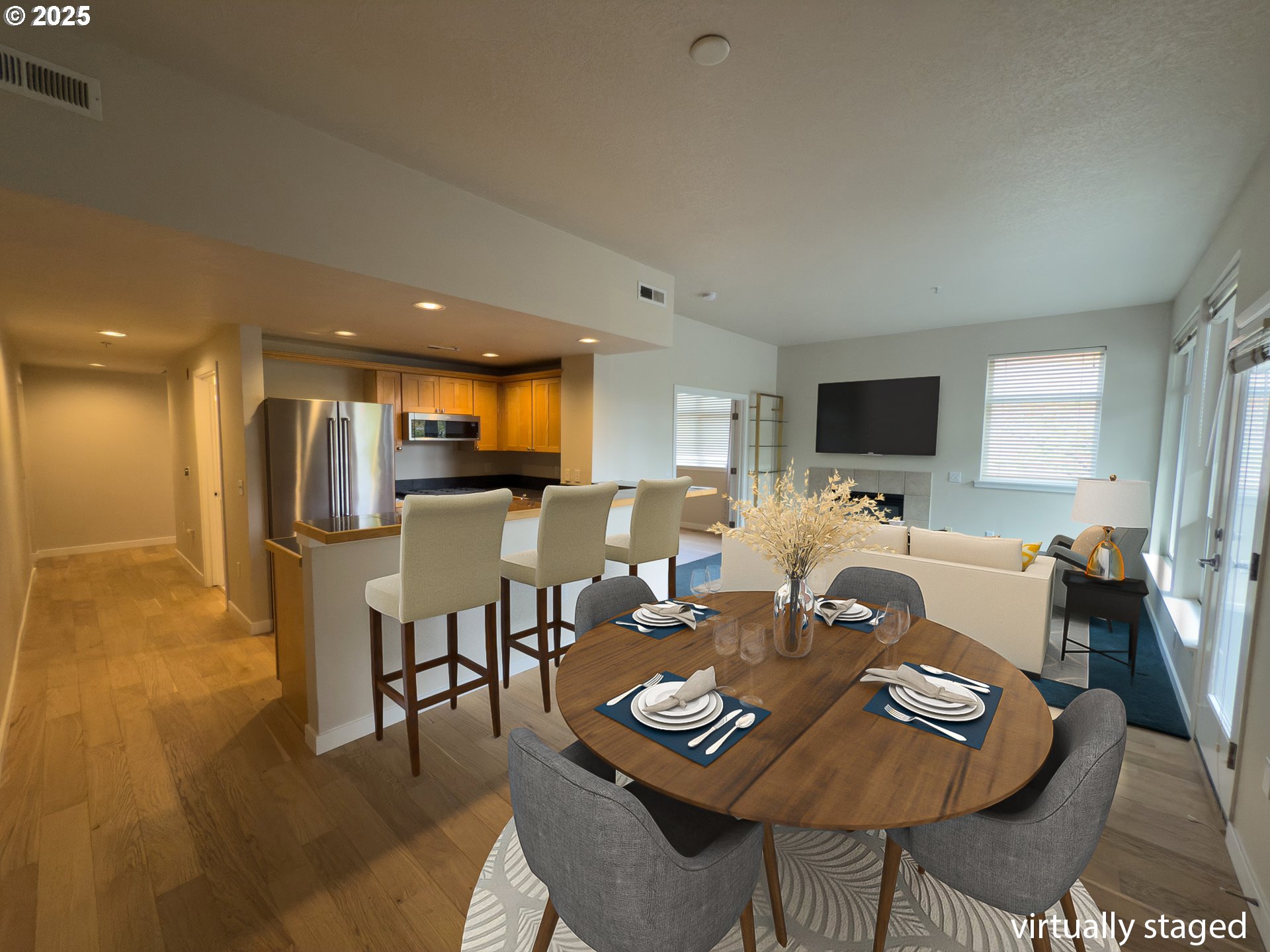 2327 Northwest Northrup Street, Unit 8 Portland, OR 97210 - Photo 30 of 33 a living room with furniture and a flat screen tv