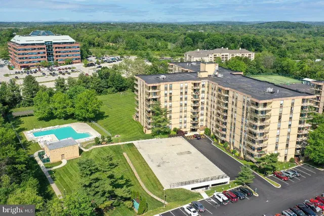 a view of a backyard with sitting area