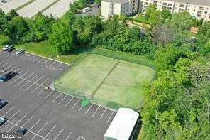 a view of a building with a yard