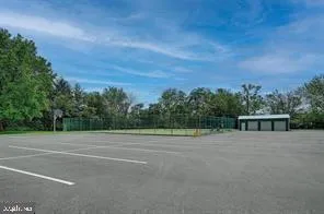 a view of a livingroom with furniture and a potted plant