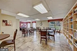 a room with a bed and a flat screen tv