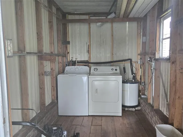 a utility room with dryer and washer