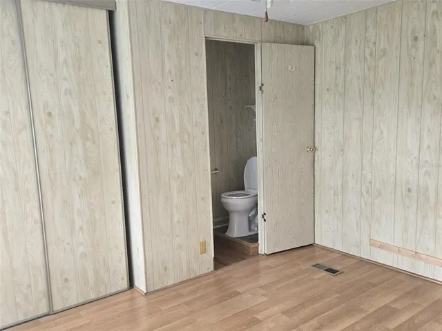 a view of a bathroom with toilet
