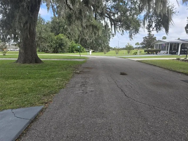 a view of a golf course with a trees