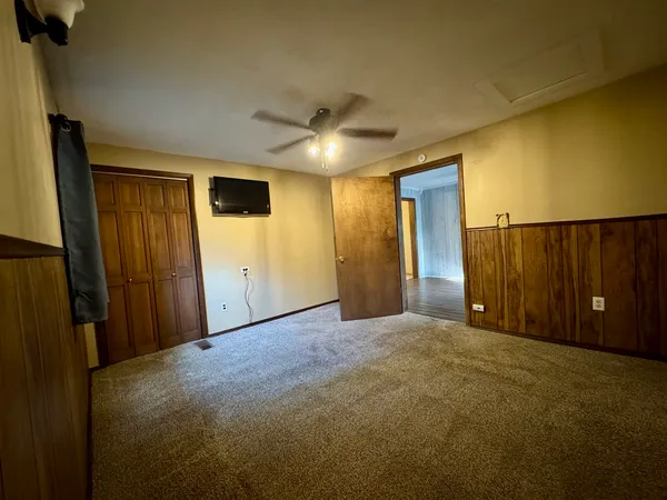 a view of a livingroom with a ceiling fan