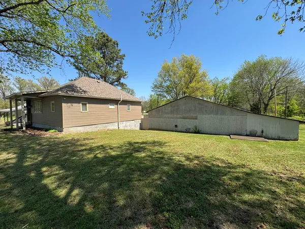 a house with a tree in front of it