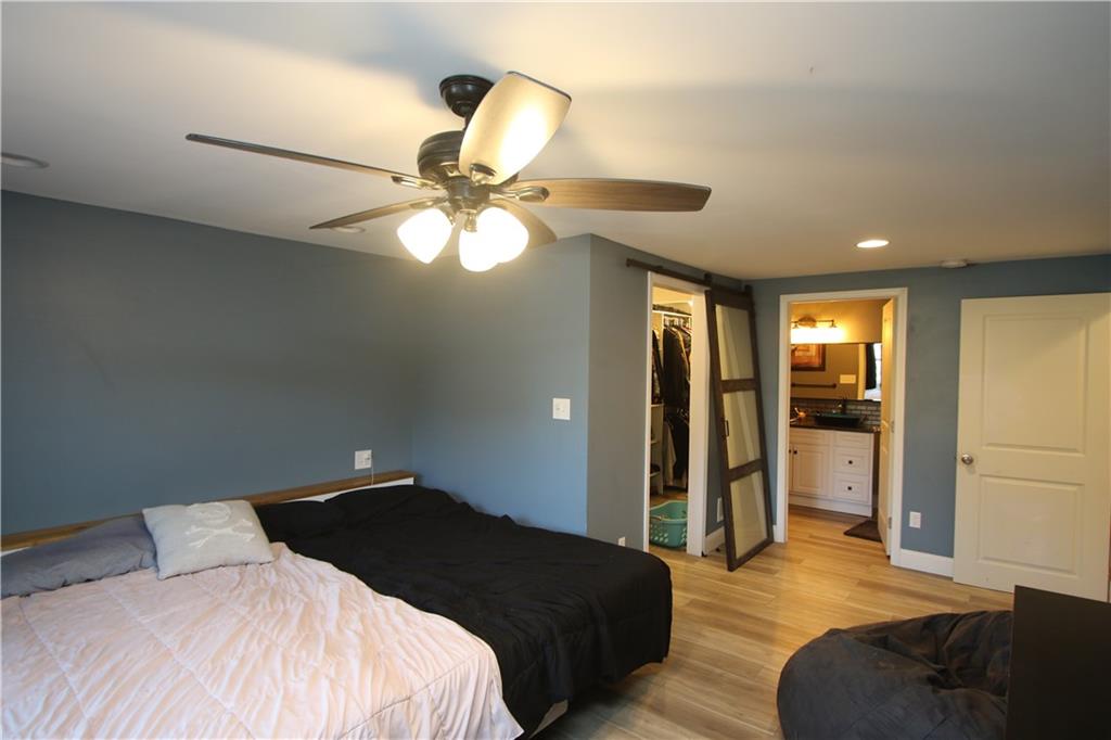 290 Lincoln Hall Road Elizabeth, PA 15037 - Photo 10 of 24 NICE First Floor 19x13 Master Suite with a Massive Walk-in-Closet & Private Full Bath. Attractive Ceiling Fan Light & Recessed Lighting