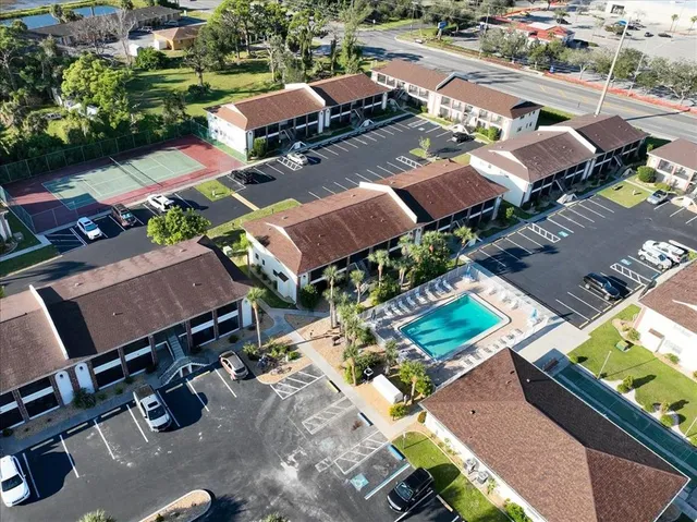 an aerial view of a house with a garden