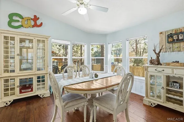 a kitchen with stainless steel appliances granite countertop a stove refrigerator and a sink
