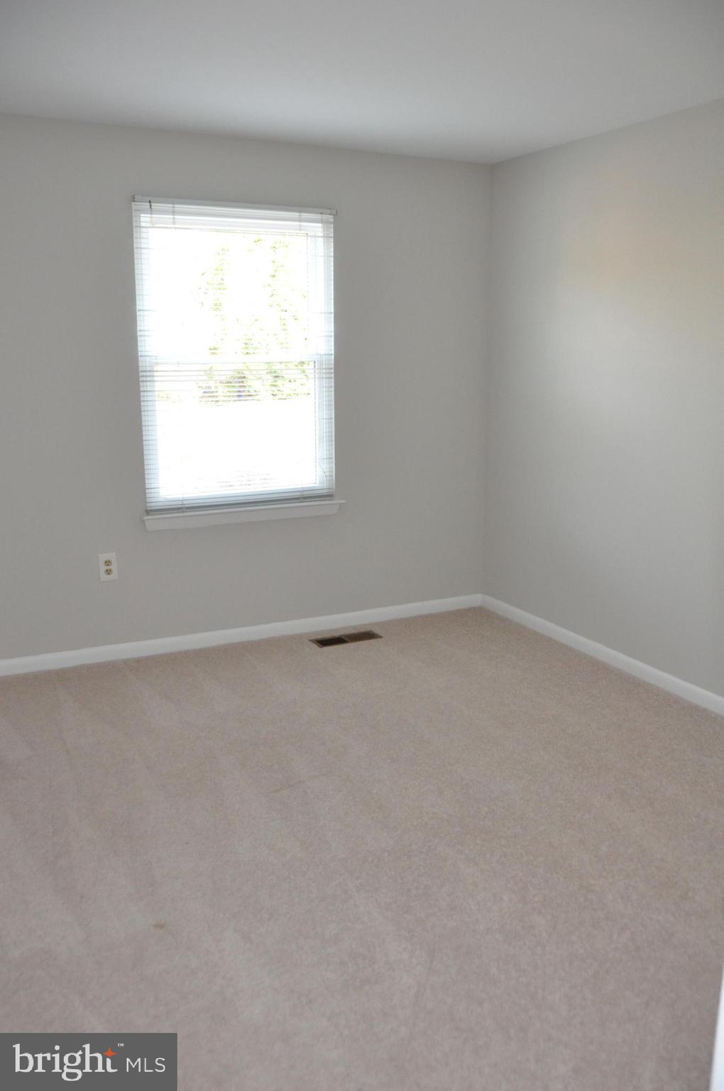 9705 Glen Avenue Silver Spring, MD 20910 - Photo 22 of 47 an empty room with a window