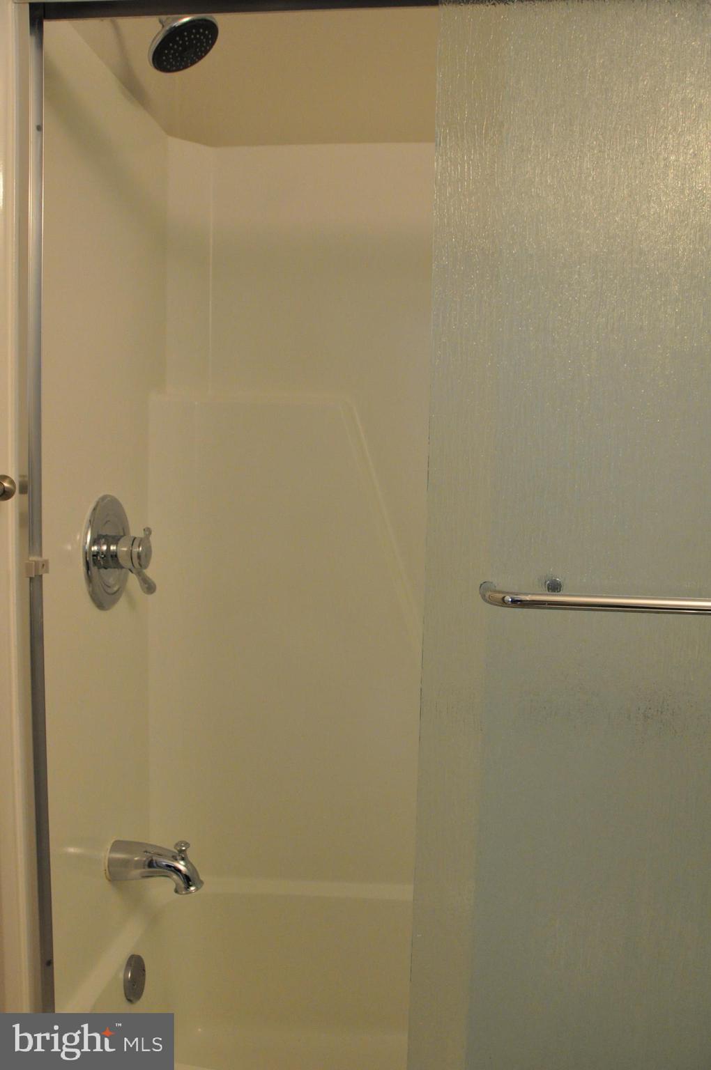 9705 Glen Avenue Silver Spring, MD 20910 - Photo 27 of 47 a bathroom with a shower