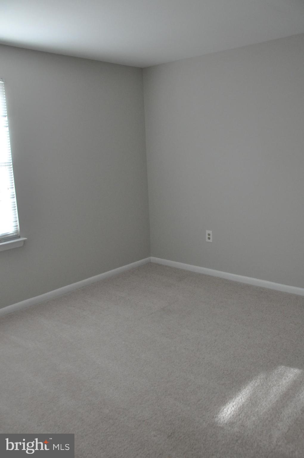 9705 Glen Avenue Silver Spring, MD 20910 - Photo 28 of 47 a view of an empty room and window