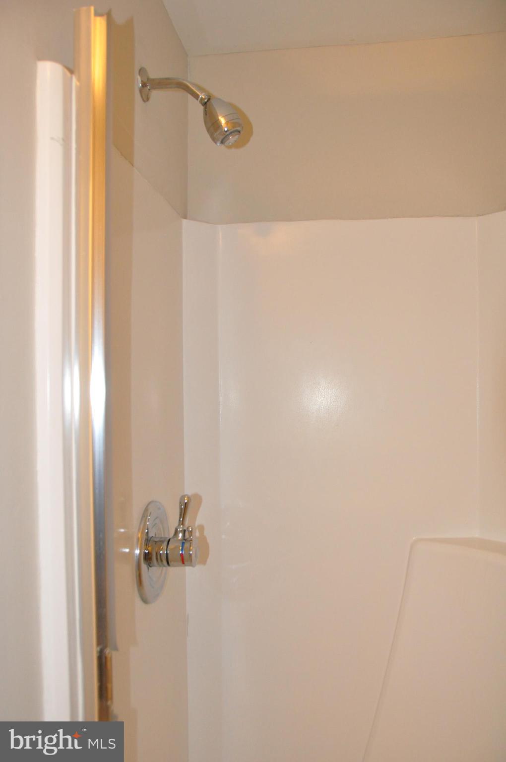 9705 Glen Avenue Silver Spring, MD 20910 - Photo 35 of 47 a bathroom with a shower