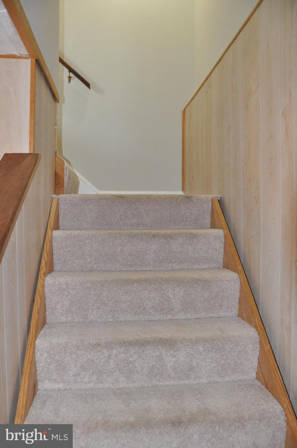 9705 Glen Avenue Silver Spring, MD 20910 - Photo 38 of 47 a view of staircase with white walls and white walls