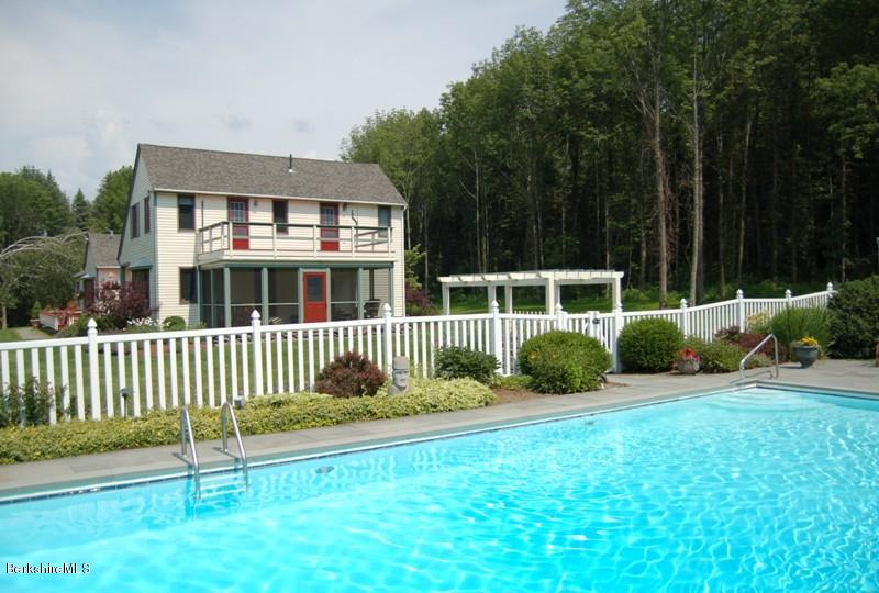 41 Baldwin Hill Road South Egremont, MA 01230 - Photo 1 of 17 a front view of a house with a garden
