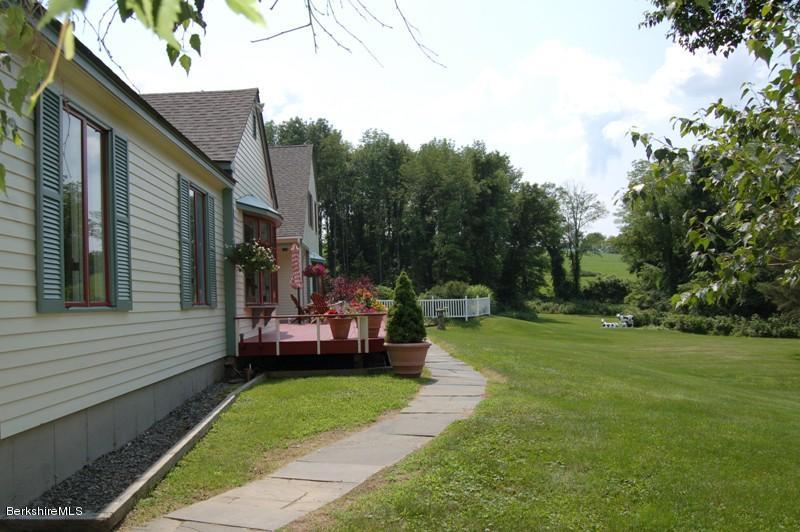 41 Baldwin Hill Road South Egremont, MA 01230 - Photo 2 of 17 a view of a house with backyard and sitting area