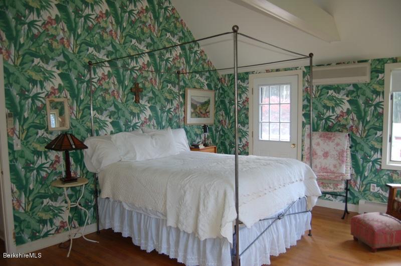 41 Baldwin Hill Road South Egremont, MA 01230 - Photo 11 of 17 a bed sitting in a bedroom next to a window