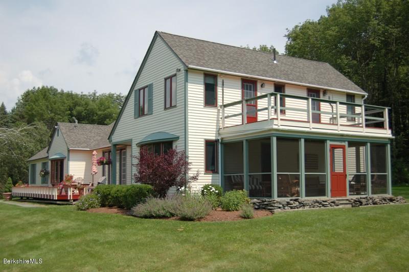 41 Baldwin Hill Road South Egremont, MA 01230 - Photo 15 of 17 a front view of a house with a garden and yard