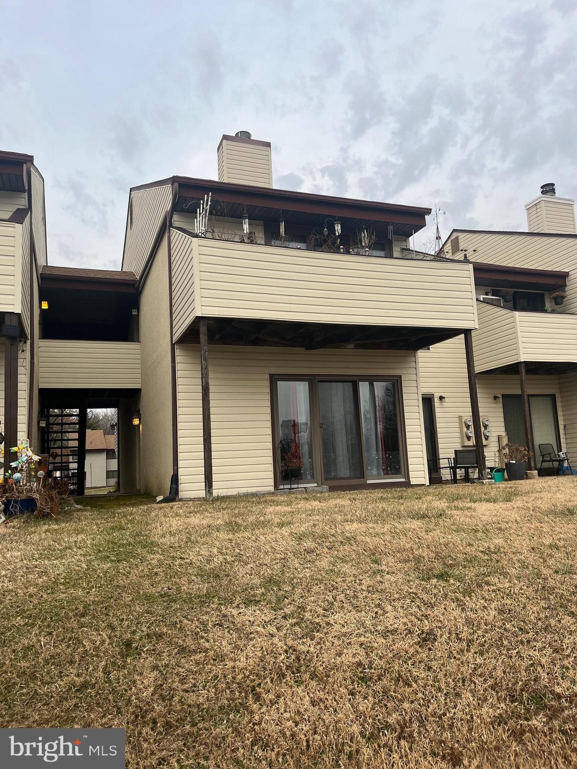 29 B East Daisy Lane Mount Laurel, NJ 08054 - Photo 4 of 14 a view of a big building with many windows