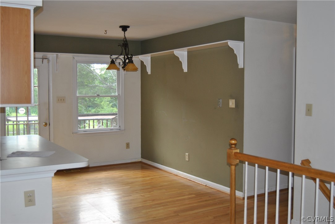 4482 Jericho Road Ruther Glen, VA 22546 - Photo 8 of 32 a view of empty room with wooden floor and fan