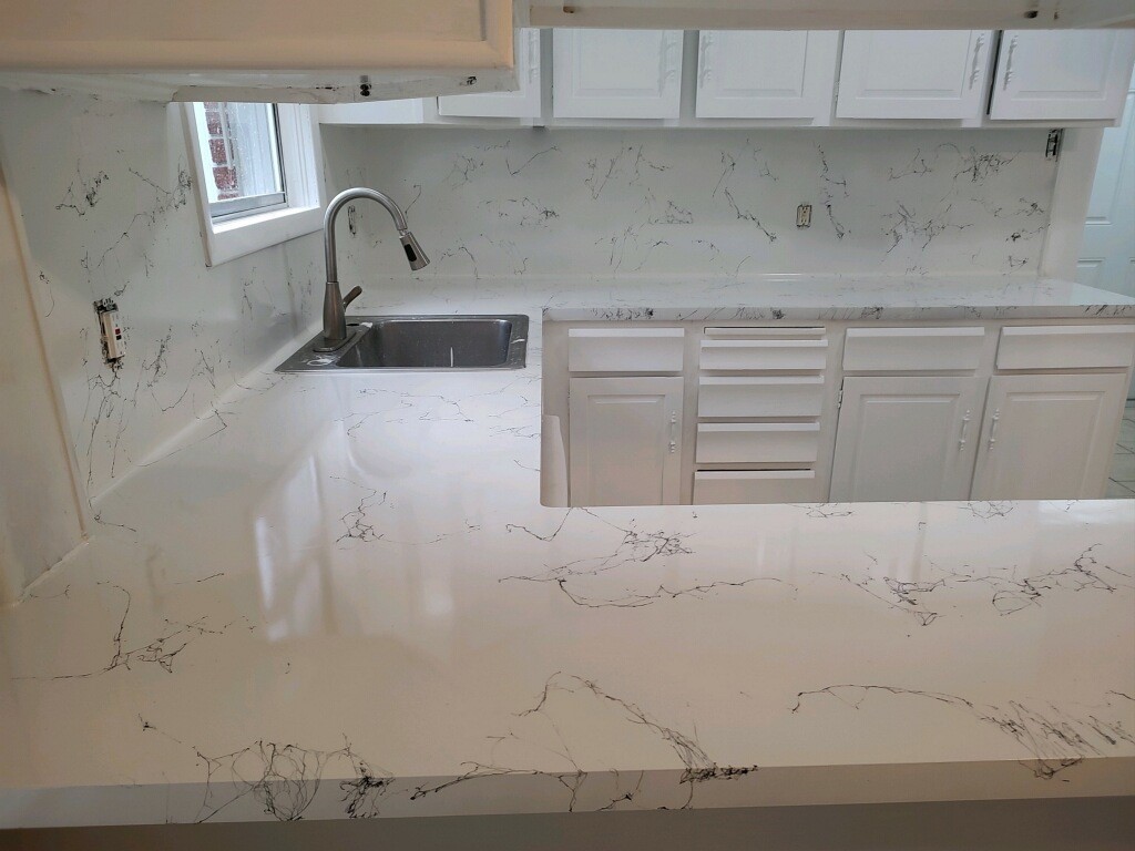 2634 Peckham Street Houston, TX 77098 - Photo 5 of 9 a bathroom with a sink and cabinets