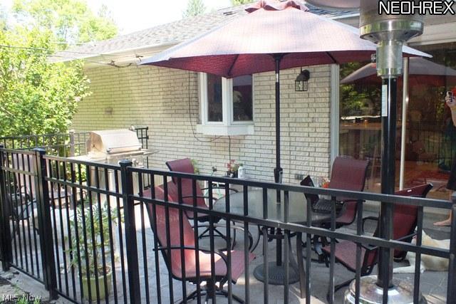 Adorable front patio open from Kitchen