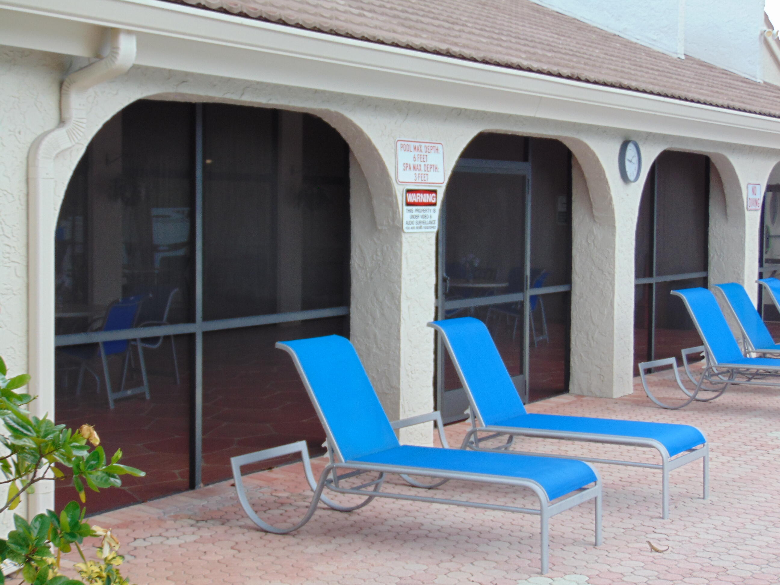 9220 Southwest 14th Street, Unit 3103 Boca Raton, FL 33428 - Photo 44 of 58 CLUBHOUSE PATIO
