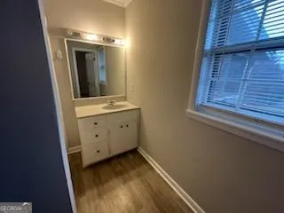 a view of a hallway and closet