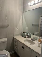 809 College Street Carrollton, GA 30117 - Photo 18 of 33 a bathroom with a sink and a toilet