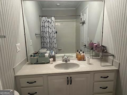 809 College Street Carrollton, GA 30117 - Photo 21 of 33 a bathroom with a sink and a mirror