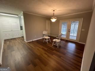 809 College Street Carrollton, GA 30117 - Photo 22 of 33 a view of a dining room with furniture wooden floor and chandelier