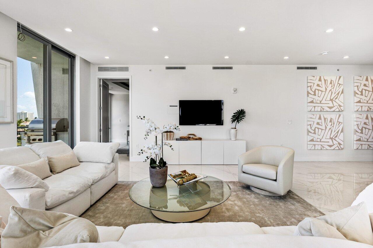 495 East Royal Palm Road, Unit 601 Boca Raton, FL 33432 - Photo 7 of 50 a living room with furniture and a flat screen tv