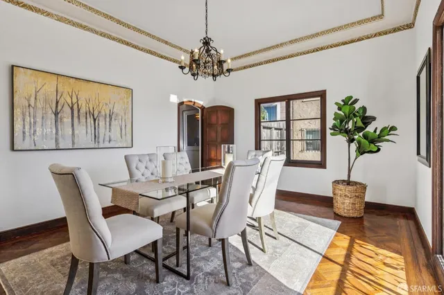 a kitchen with a sink appliances and cabinets