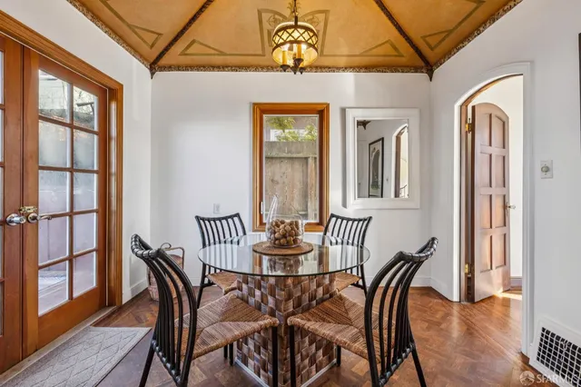 a view of an outdoor sitting area with furniture