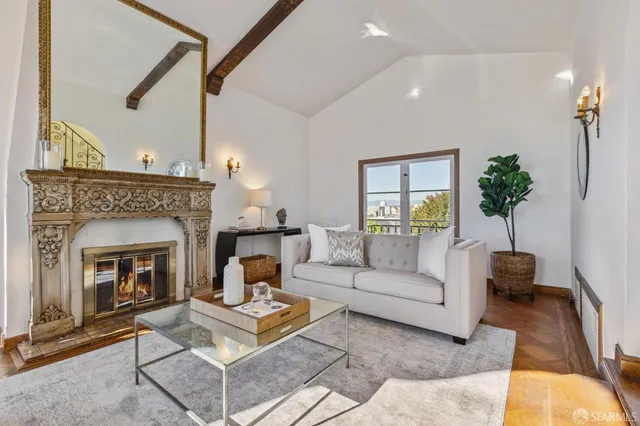 a living room with furniture and a window